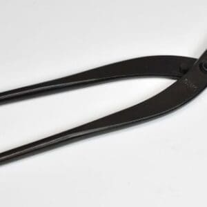 Black farrier hoof nippers on white background.