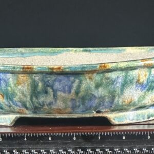 Colorful ceramic bowl with scale measurement.