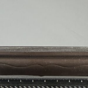 Rectangular brown planter with decorative base.