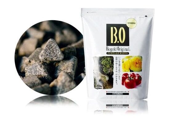 Fertilizer bag with close-up of pellets.